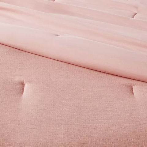 Full/Queen Reversible Microfiber Micro Texture Comforter Light Pink - Room Essentials™